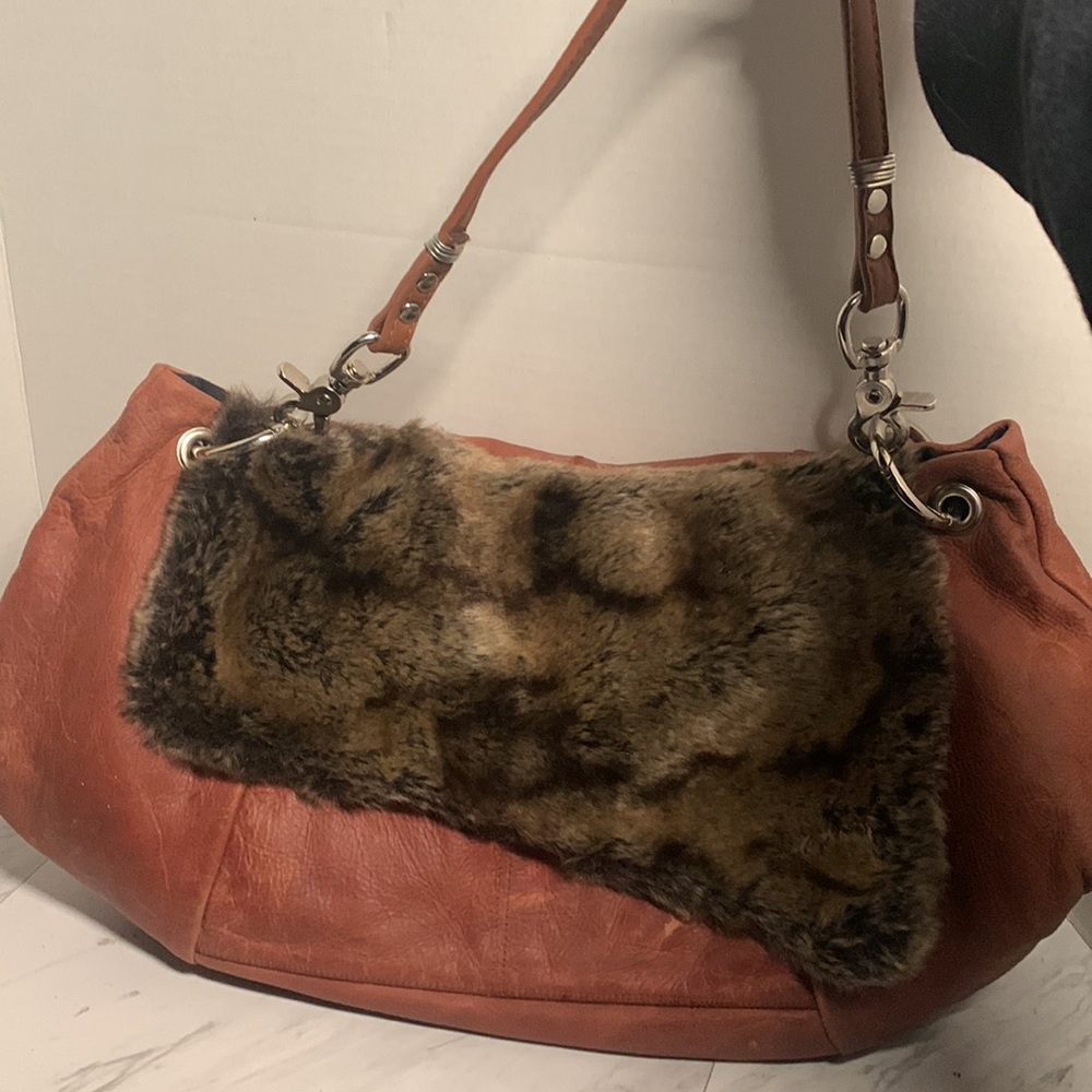 Distressed soft leather & fur purse